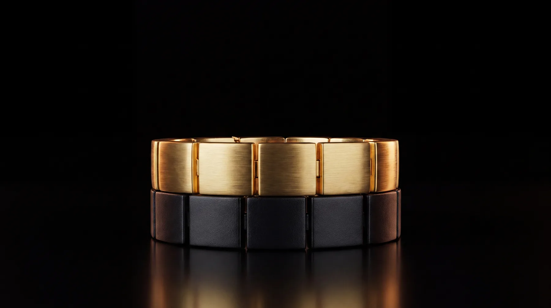 Vitul bracelets in gold-toned Sol and dark Onyx titanium